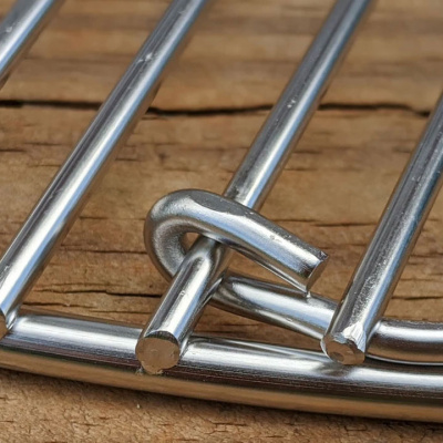 Вращающаяся решетка Slow 'N Sear EasySpin для угольных грилей 57 см, с откидной створкой Вращающаяся решетка Slow 'N Sear EasySpin для угольных грилей 57 см, с откидной створкой